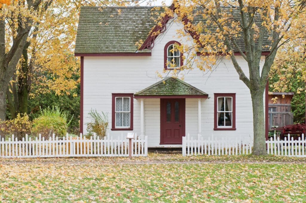 A small house in Autumn, representing real estate remedies in British Columbia
