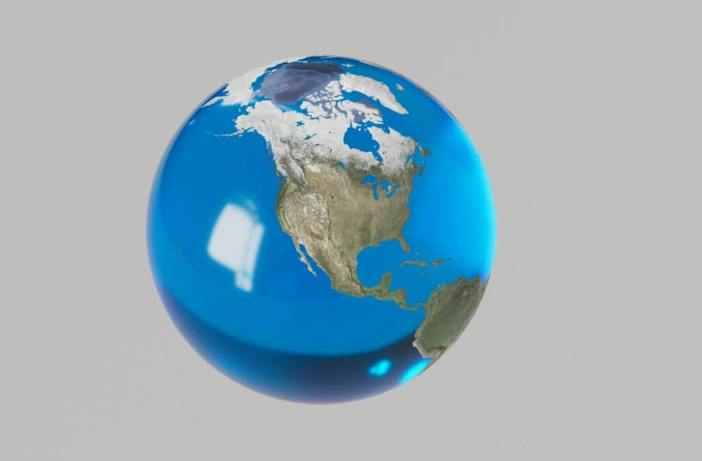 A transparent, glass globe of the world suspended in the air, representing judicial comity, US discoveries in Canada, Letters Rogatory in Canada and international law