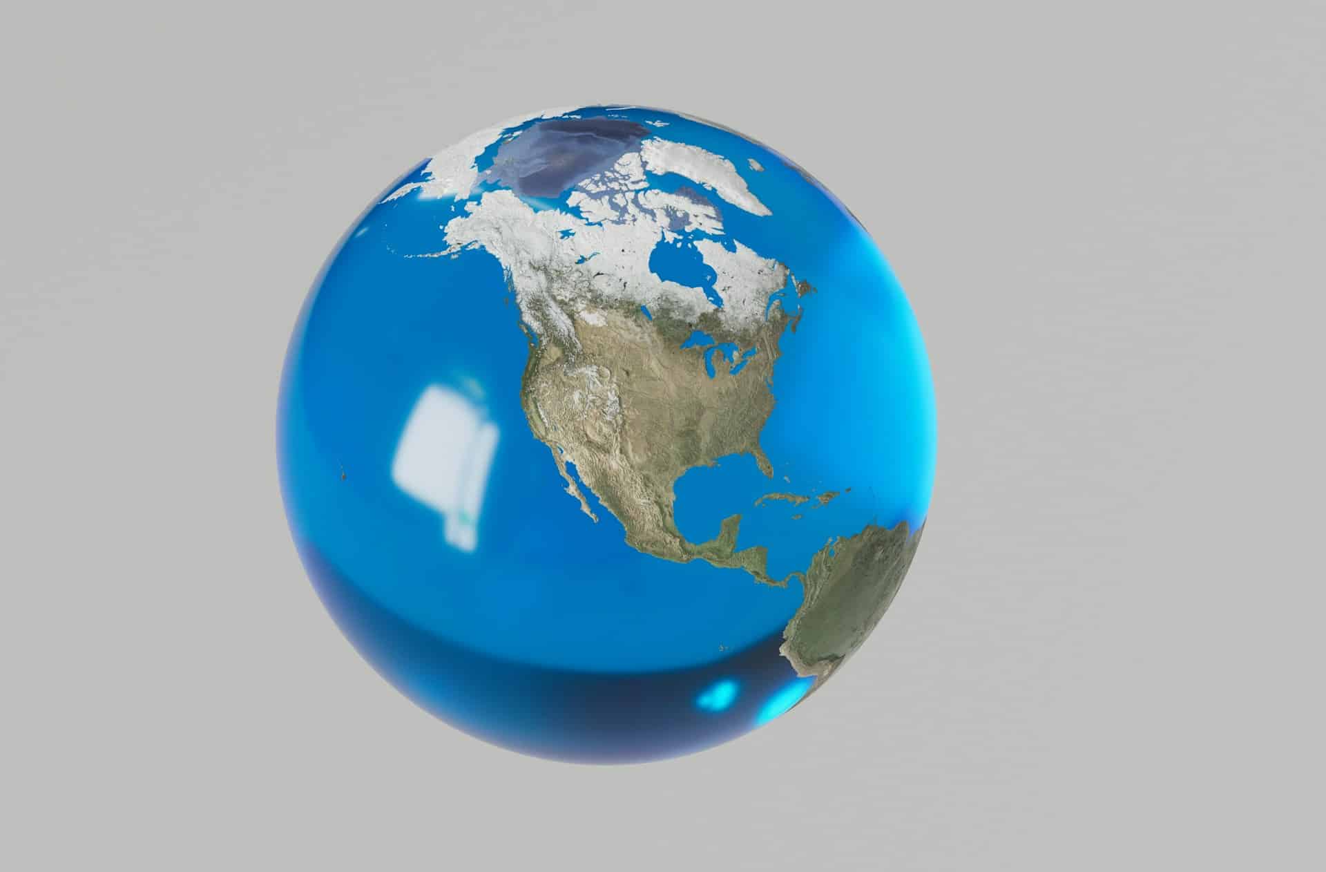 A transparent, glass globe of the world suspended in the air, representing judicial comity, US discoveries in Canada, Letters Rogatory in Canada and international law