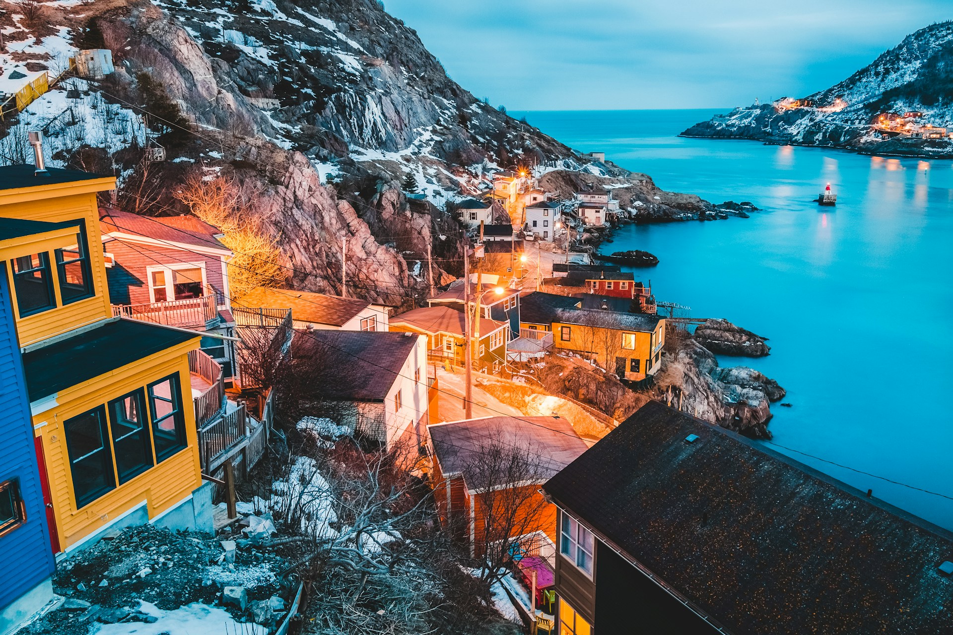View of the Battery district of St. John's, Newfoundland, at sunset, representing the Supreme Court of Canada's decision in Patrick Street Holdings Ltd. v. 11368 NL Inc. and their ruling on issue and cause of action estoppel.